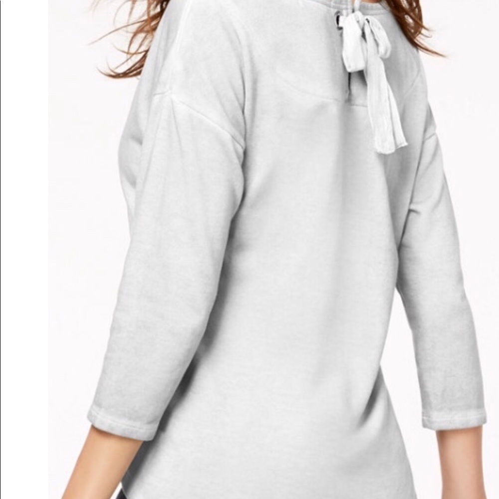 Dark Gray sweatshirt with bow tie in back.